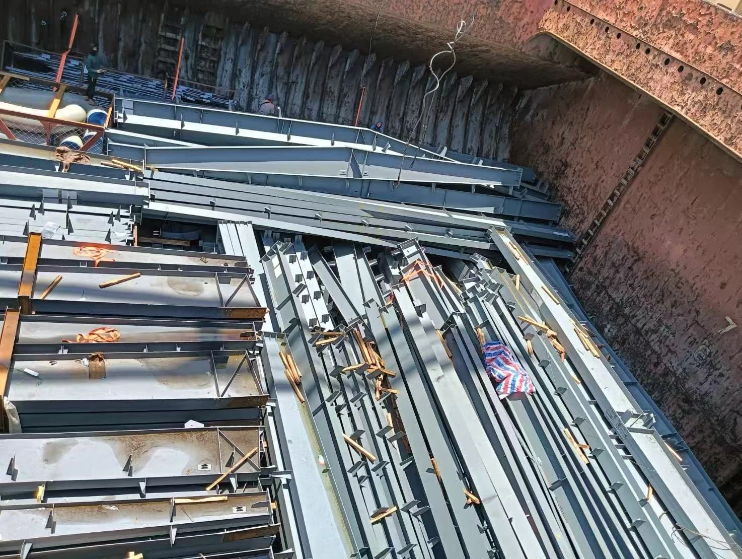 Steel sections arranged inside the hold of a breakbulk vessel