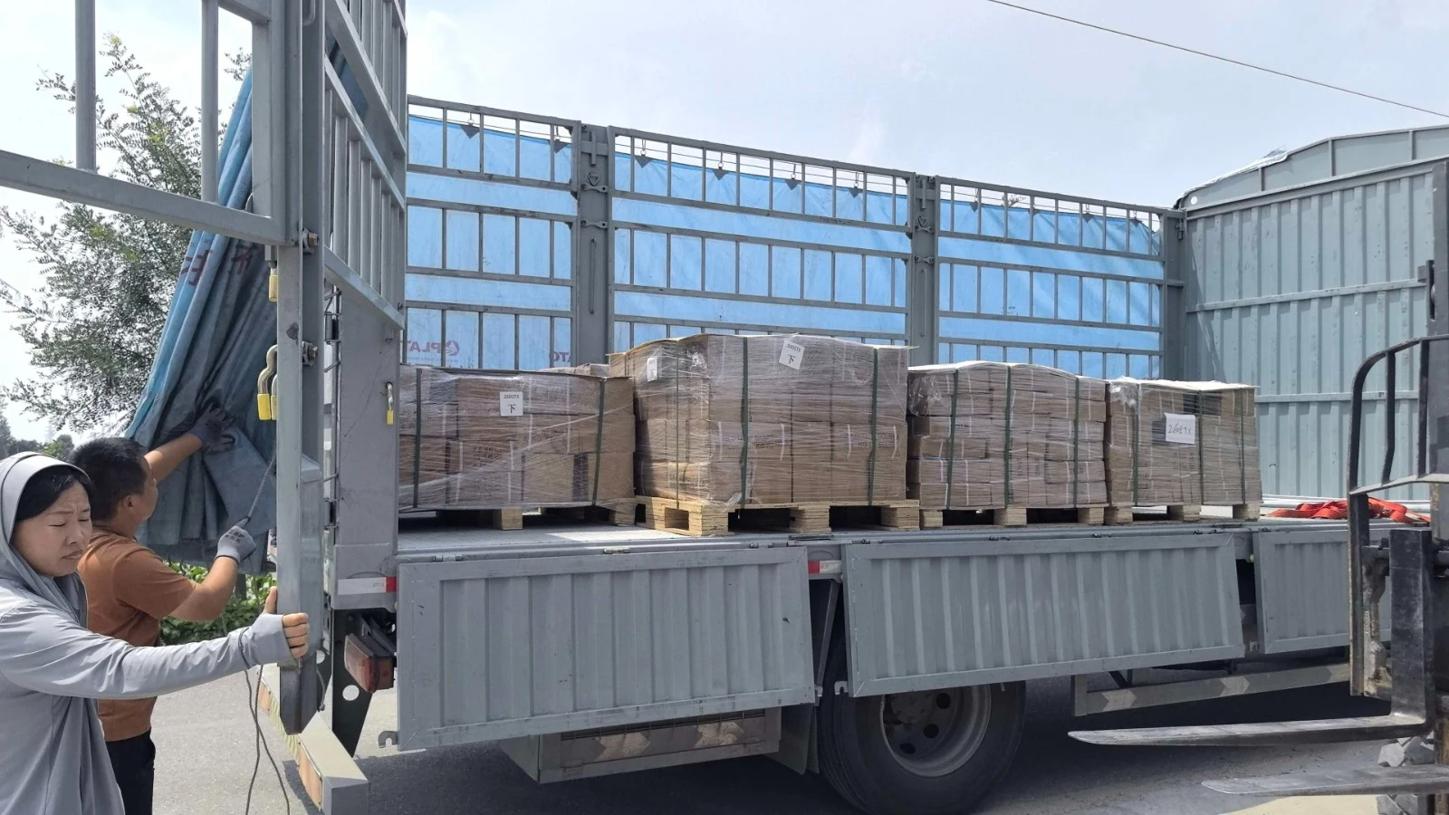 Palletized cargo on a collection truck